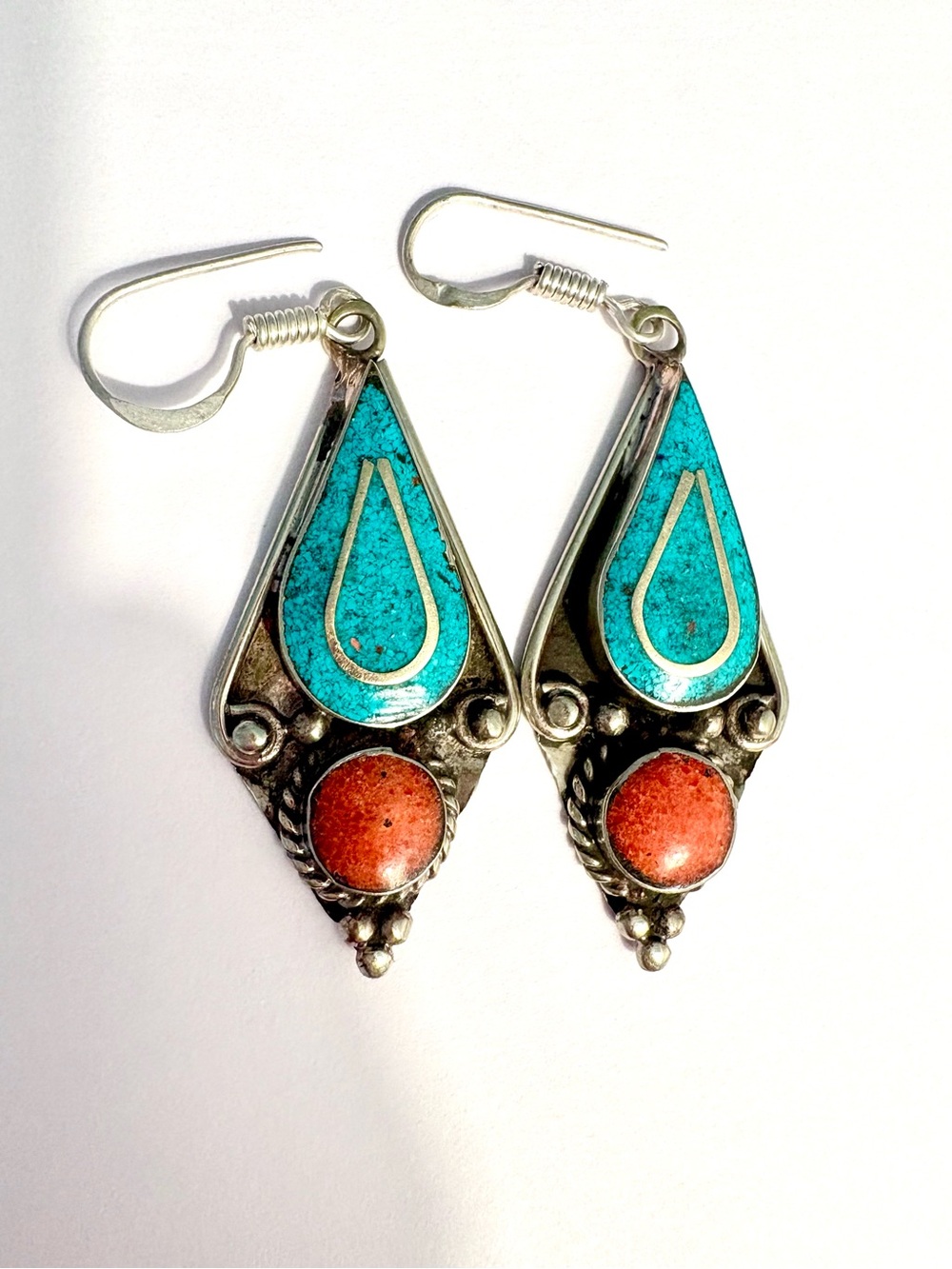 Beautiful 2 inch, 925 marked, Coral and Turquoise earrings .